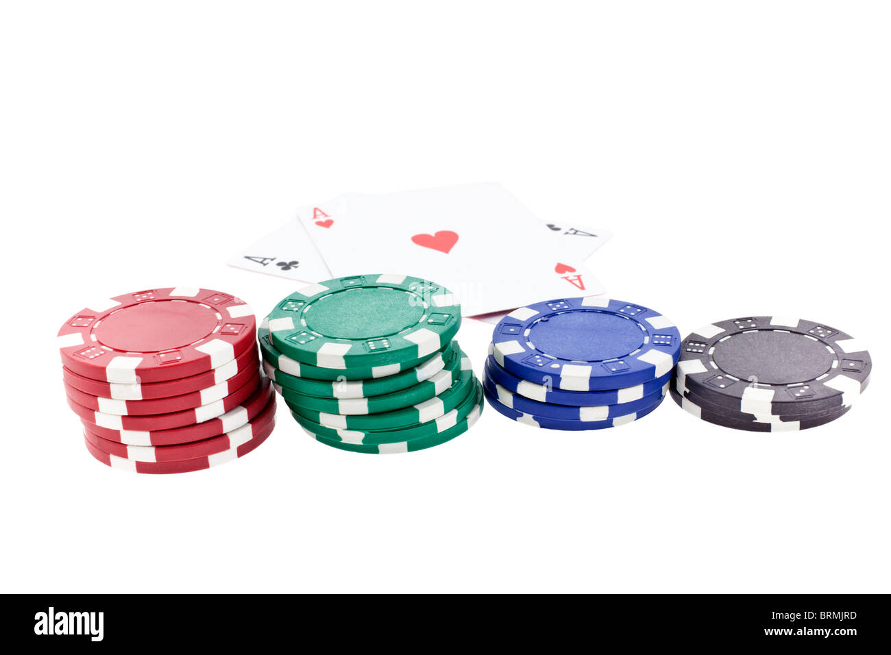 color poker chip stacks and two ace cards on white background Stock Photo