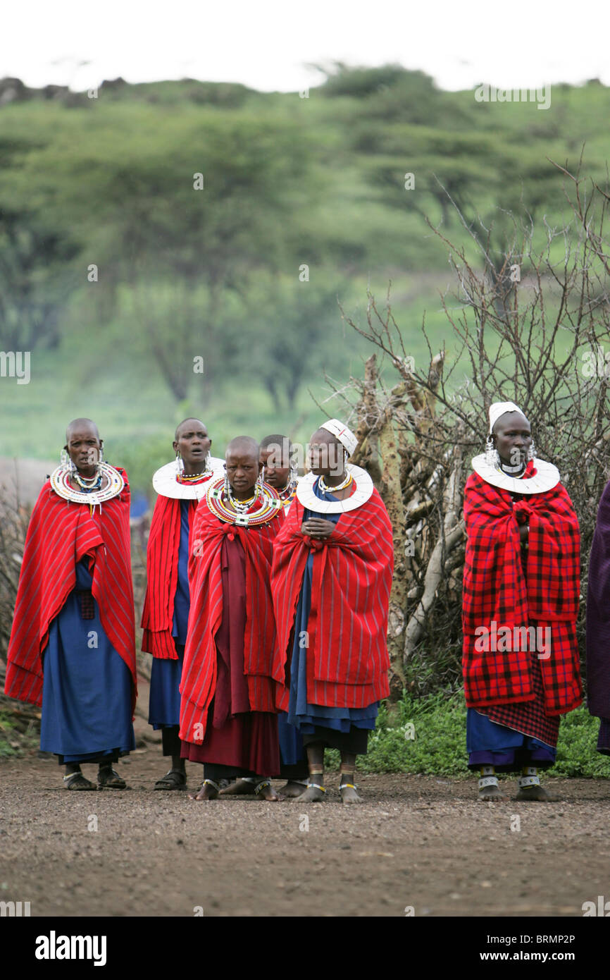Maasai villagers standing wearing the traditional shuka Stock Photo