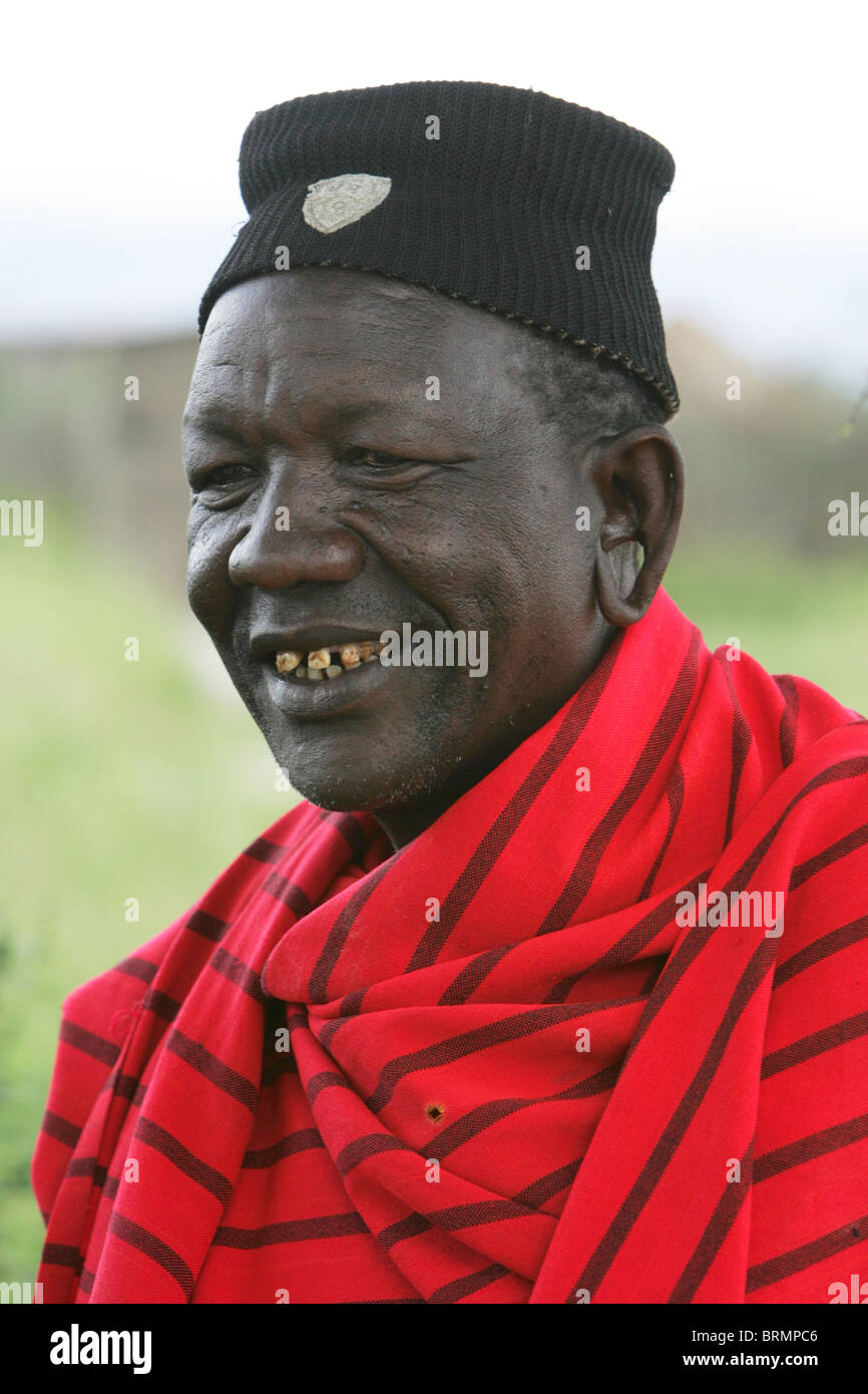 Male Maasai in traditional Shuka clothing with spear, Tsavo West