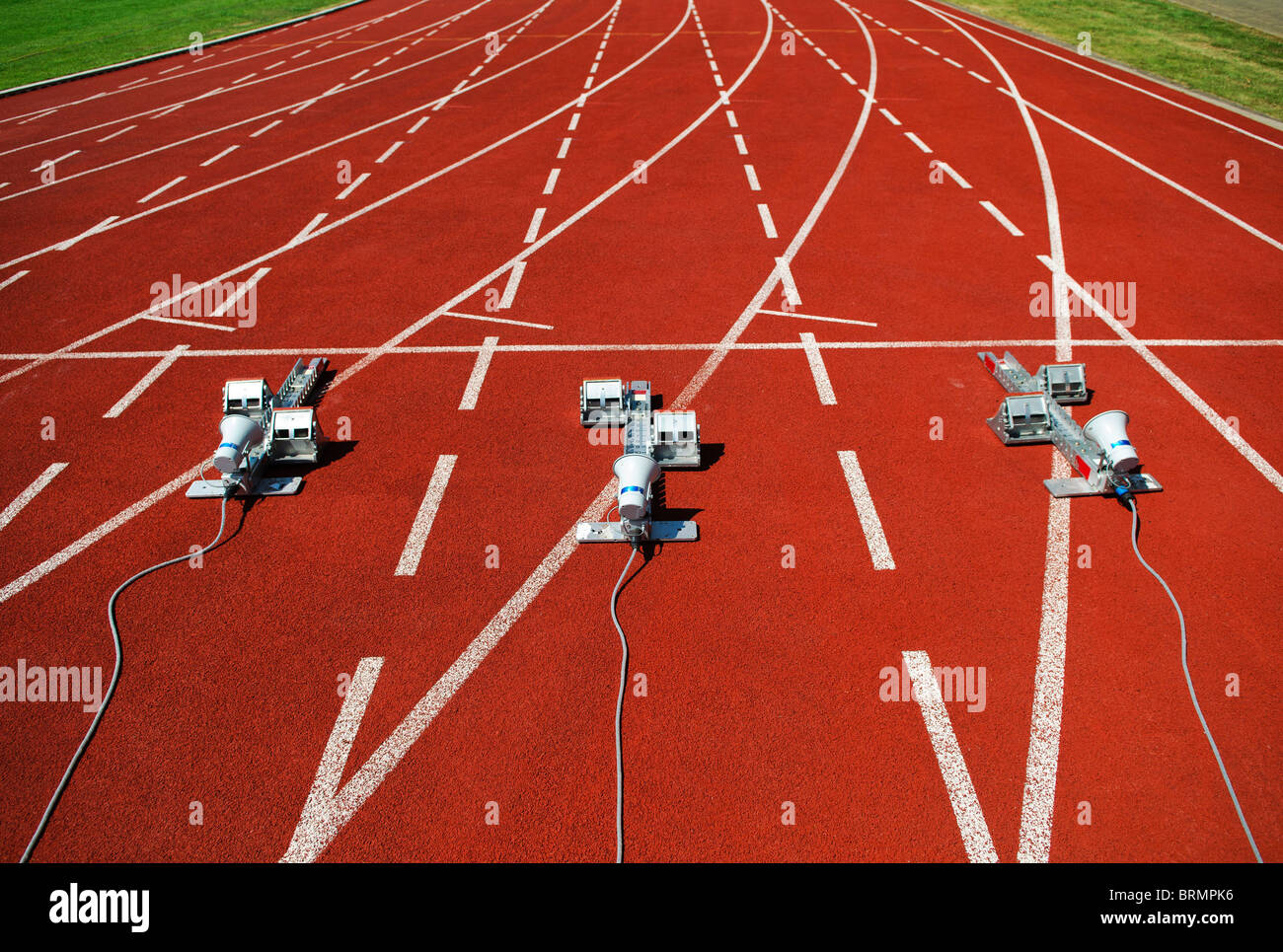 starting blocks on sports running track Stock Photo Alamy