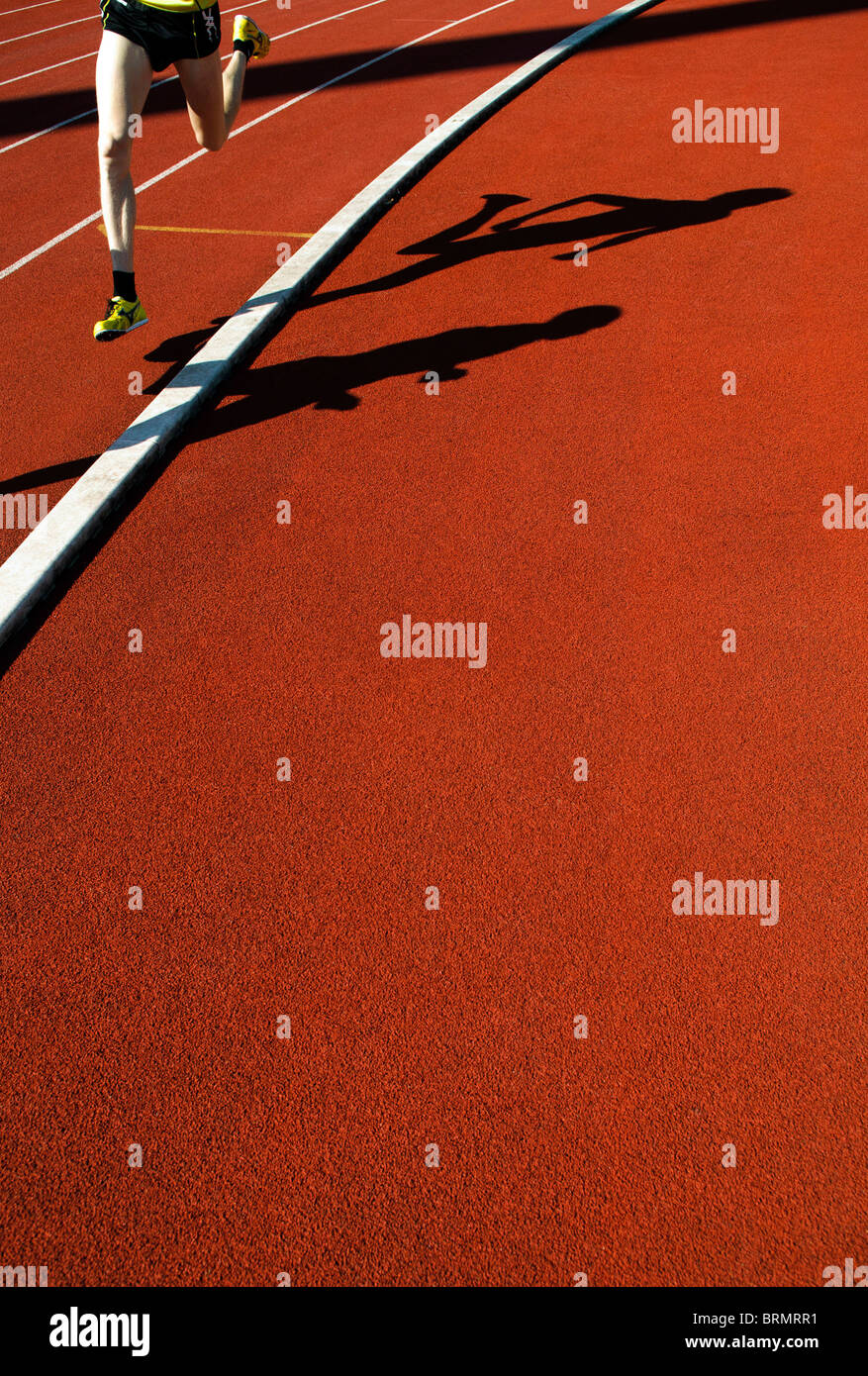 shadows of runners during 800m race during outdoor track and field