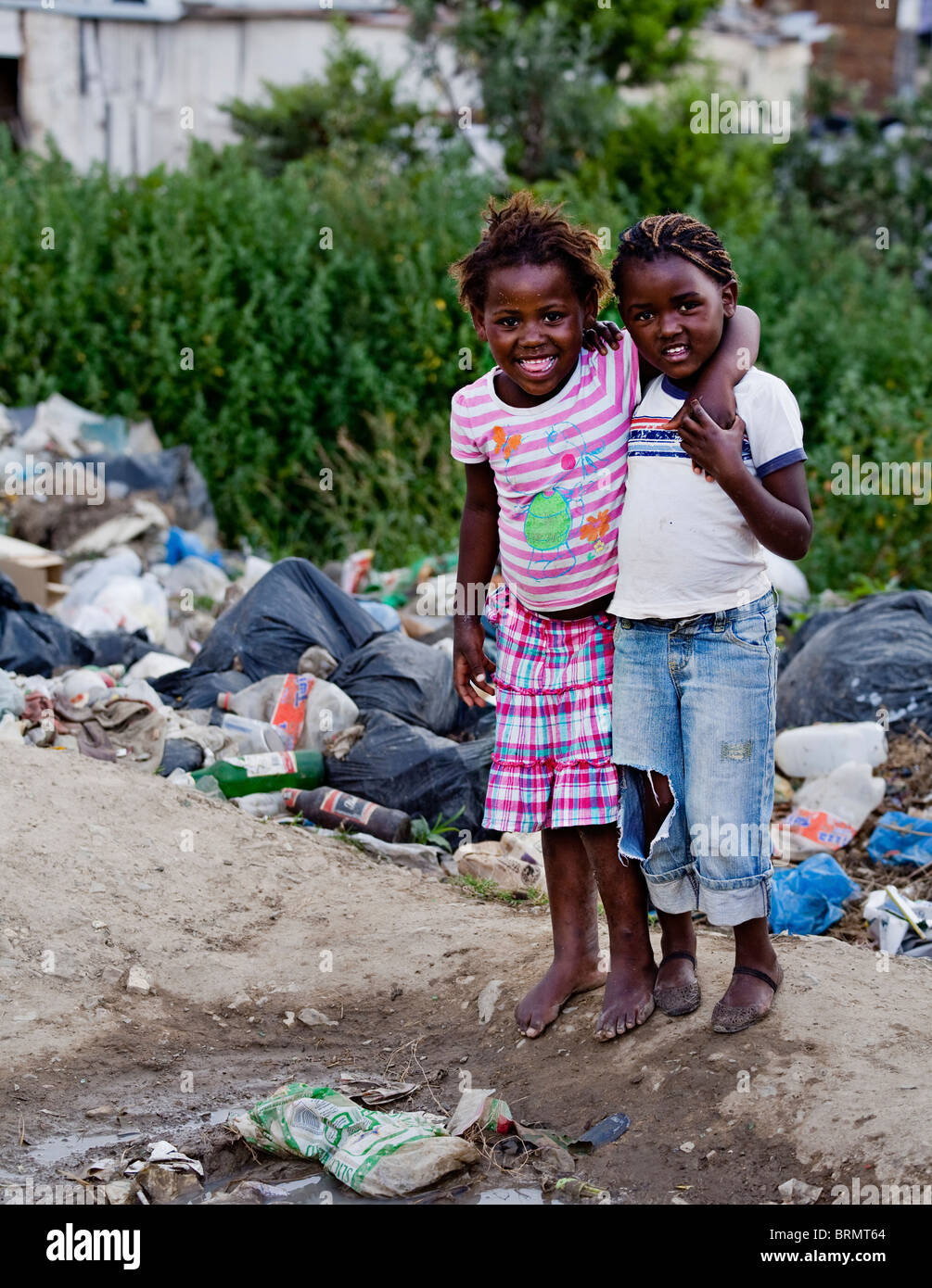 Two young African girls at a local rubbish dump Stock Photo