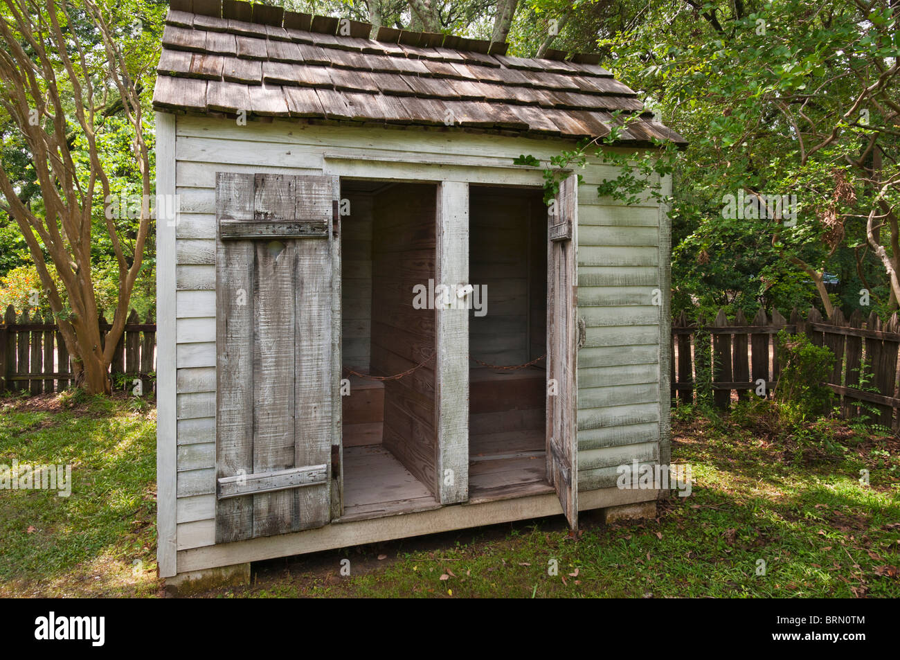 Louisiana, Baton Rouge, Rural Life Museum circa 19th century, four hole outhouse Stock Photo