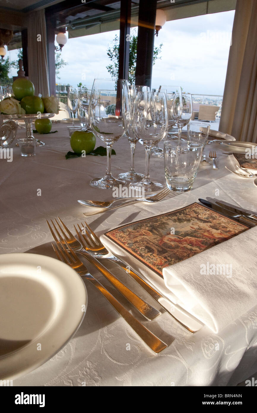 Table set furnishings luxury hotel in Rome Italy Stock Photo