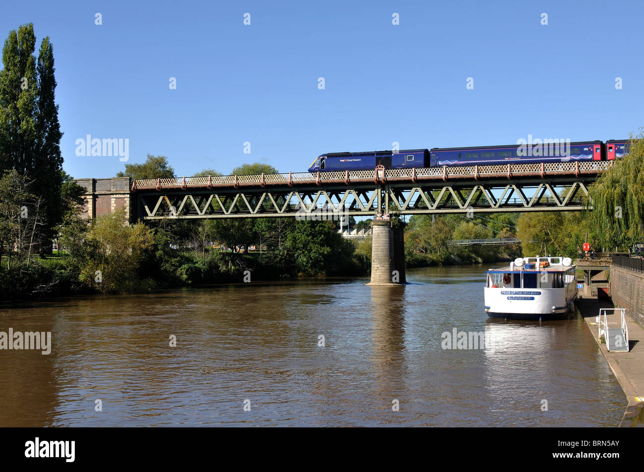 Train on bridge crossing River Severn, Worcester, Worcestershire, England, UK Stock Photo