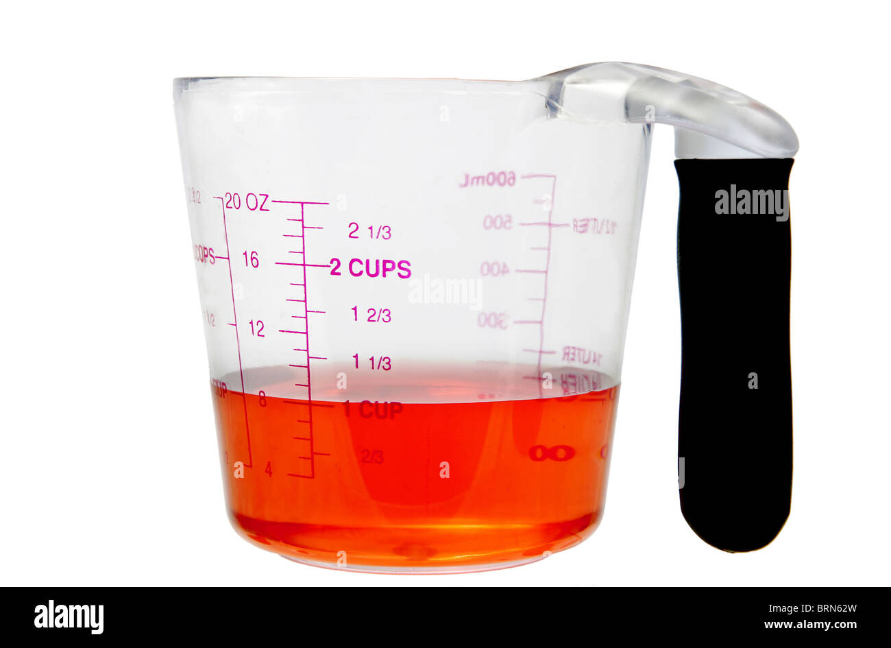 english standard unit measuring cup with red liquid inside Stock Photo