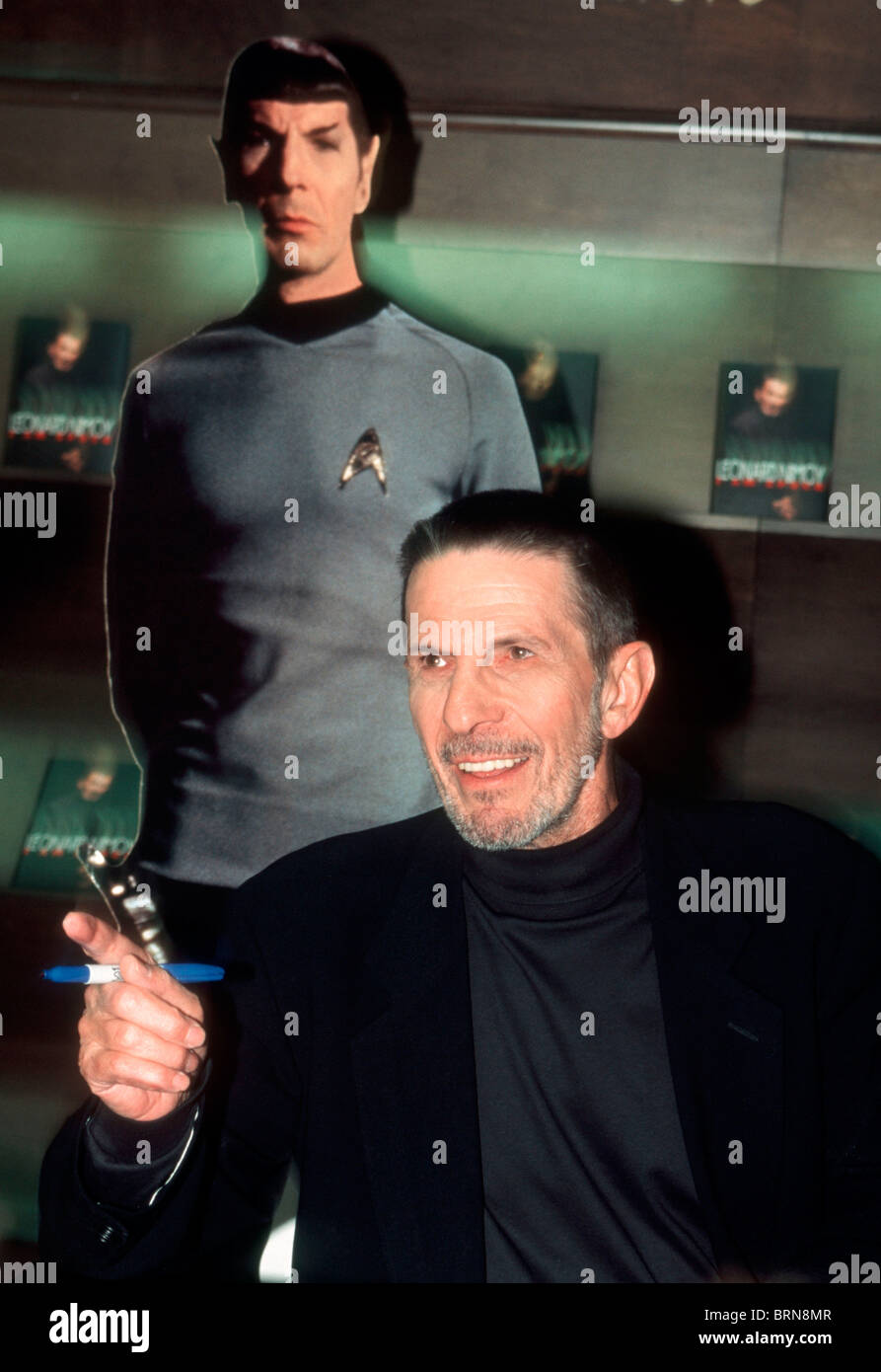 Leonard Nimoy, the actor who played 'Spock' on the Star Trek television series, signs copies of his book Stock Photo