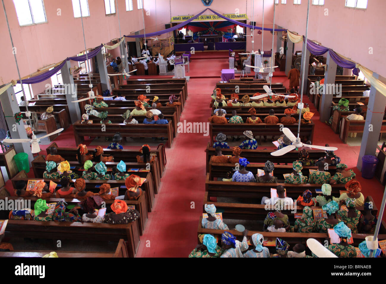 Interior of a church building at Ikoro-Ekiti, Ekiti State, in Nigeria during service Stock Photo
