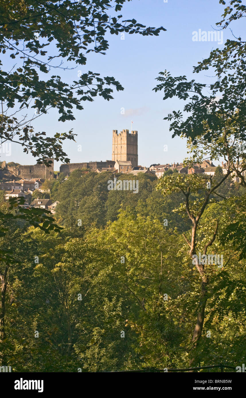 The castle and town of Richmond, North Yorkshire seen from the woodland walk to Easby Abbey