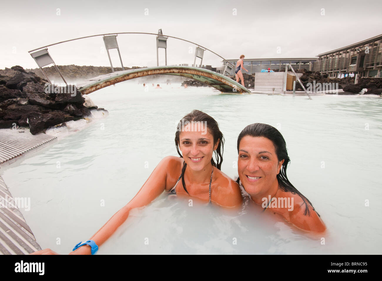 Two Spanish ladies relaxing at the Blue Lagoon near at Keflavik in Iceland. Stock Photo