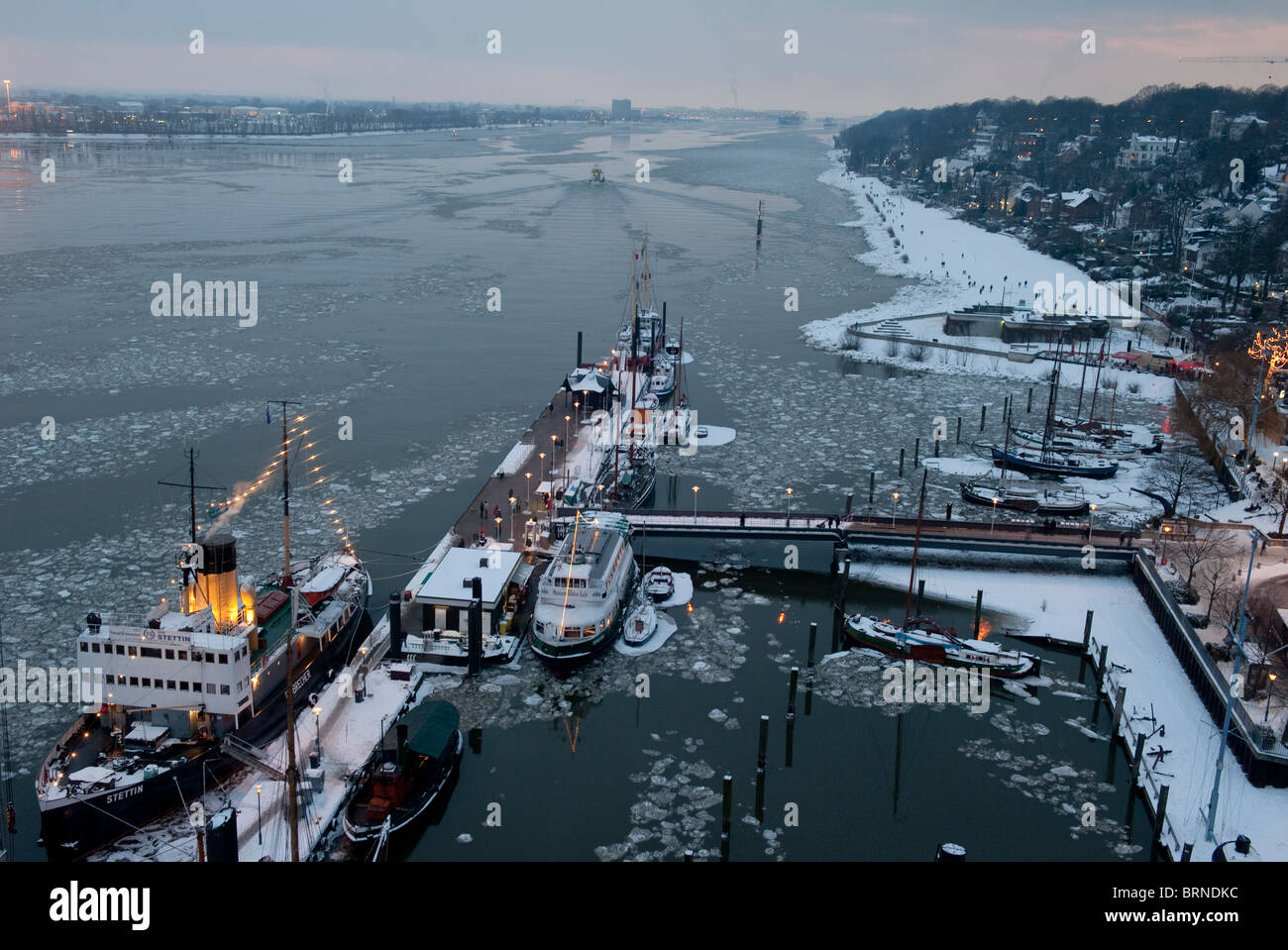 Europe Germany Hamburg, river Elbe, beach and museum port Oevelgoenne in Winter with ice and snow Stock Photo