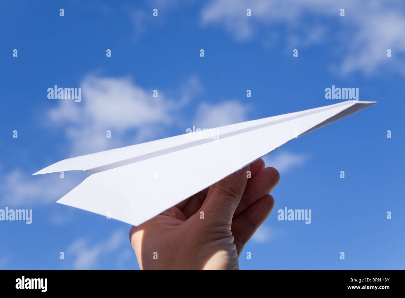 White Paper Airplane and blue sky Stock Photo - Alamy