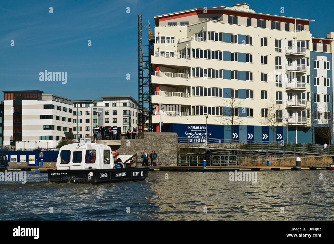 dh Port of Bristol BRISTOL DOCKS BRISTOL Ferry boat crossing harbour luxury dockside apartment flats waterfront houses uk Stock Photo