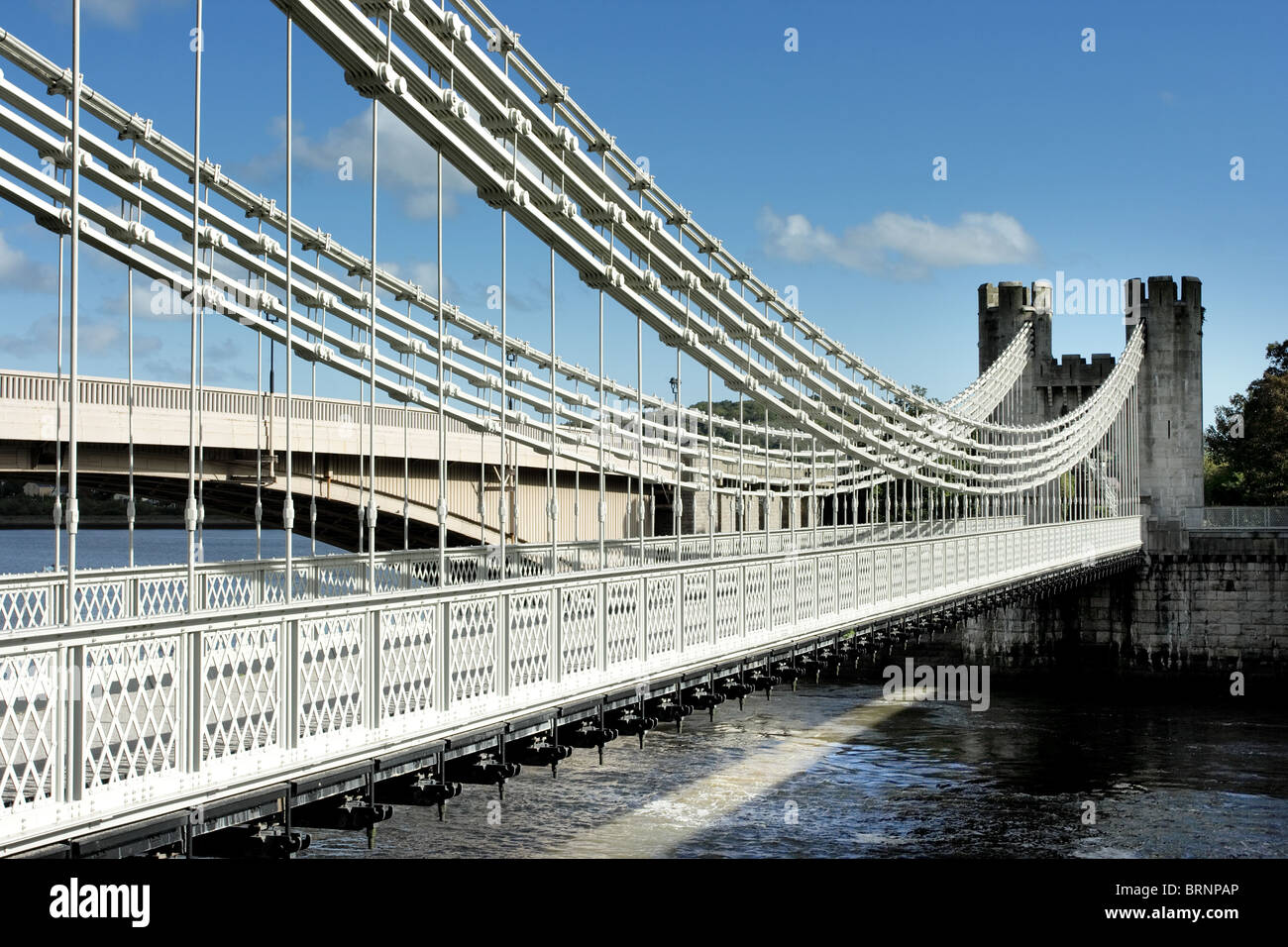 suspension bridge built by Thomas Telford across the river Conway Stock ...