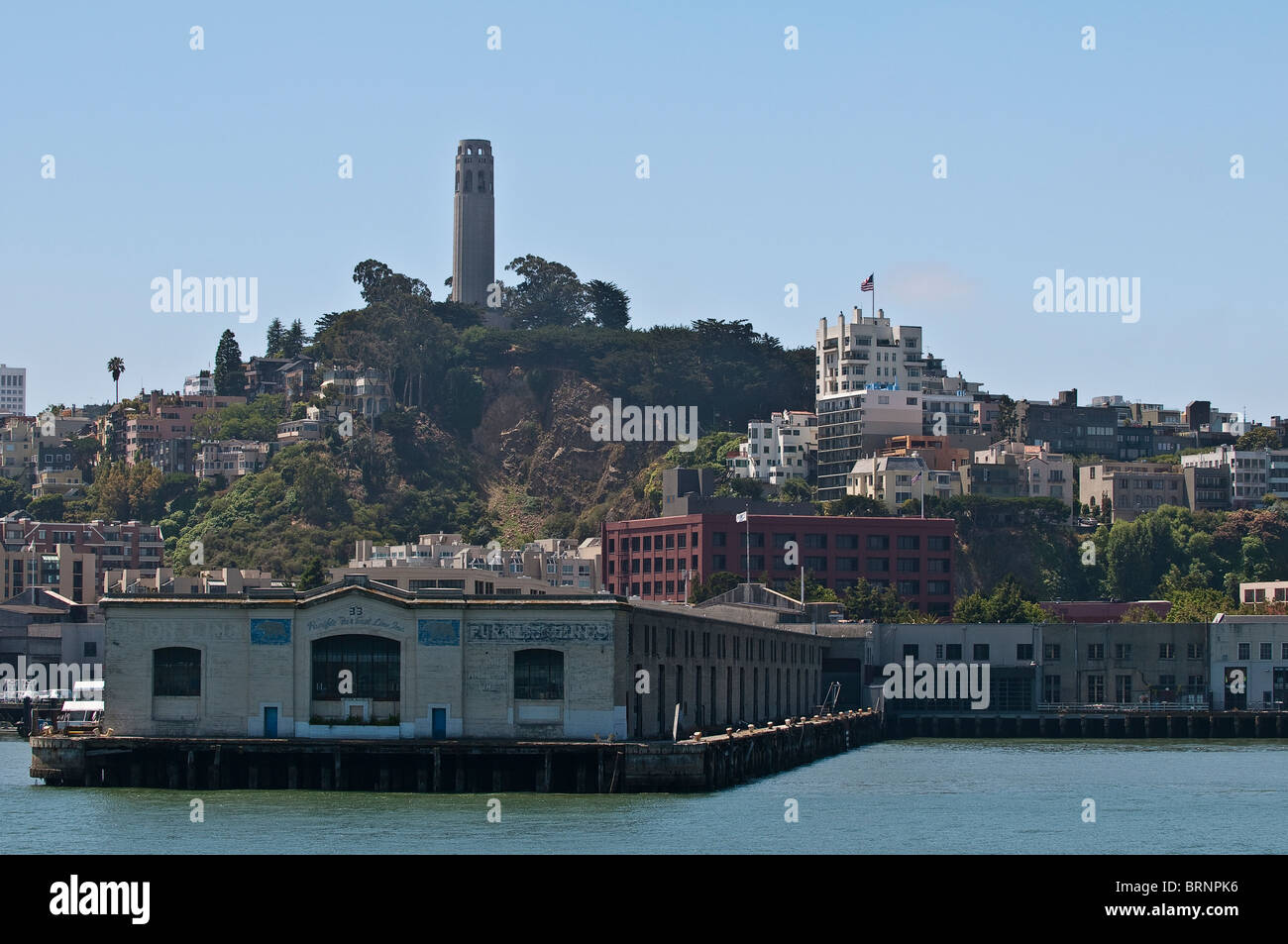 Fishermans Wharf in front of Coit Tower, an observation tower, San Francisco, California, USA Stock Photo