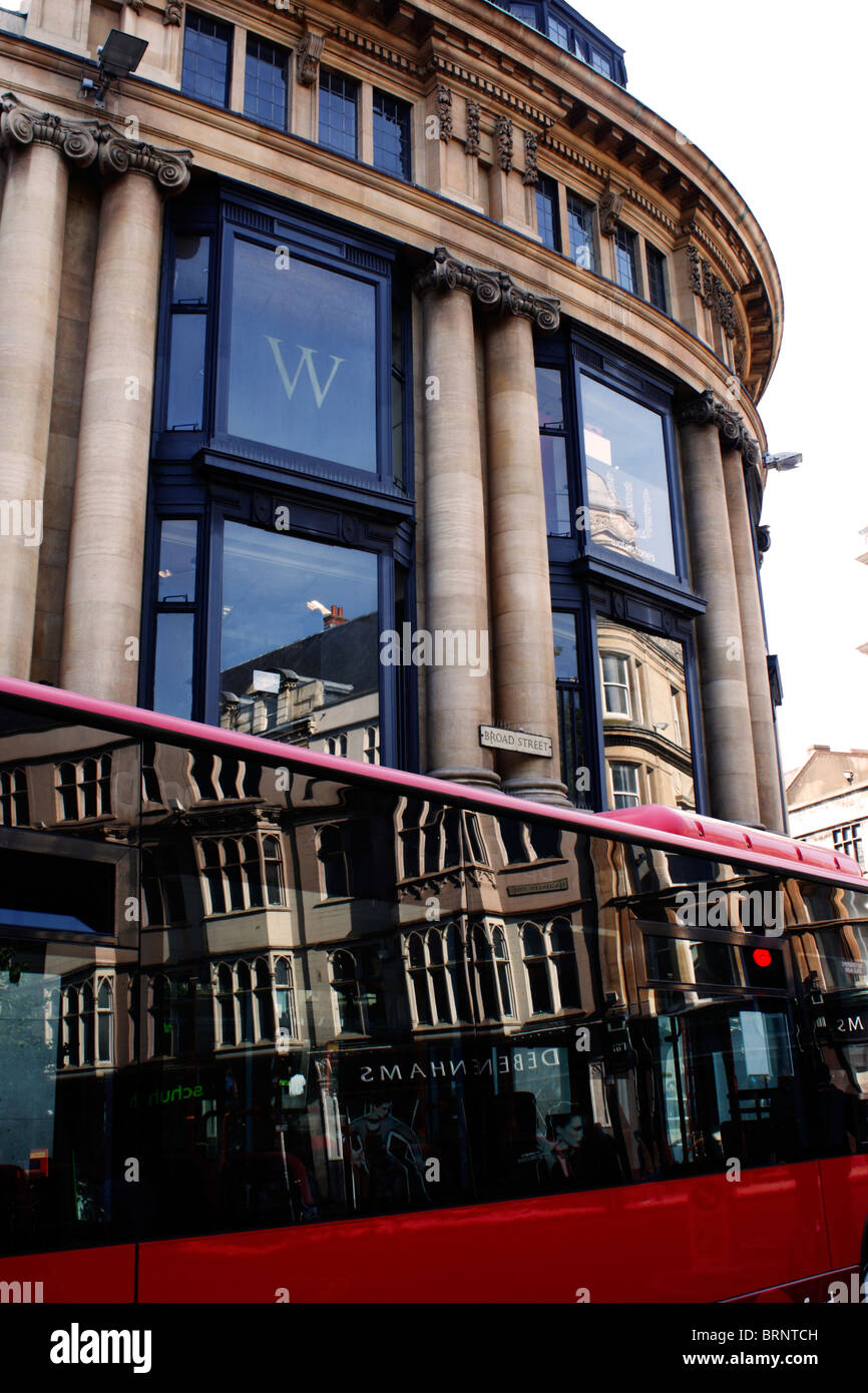 A red bus outside Waterstones book store in the city of Oxford, England Stock Photo