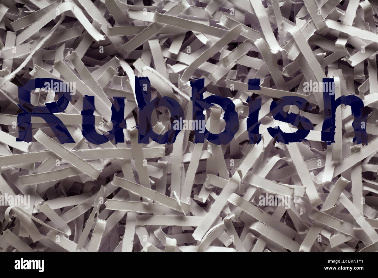 close up detail image of shredded paper with the word rubbish printed