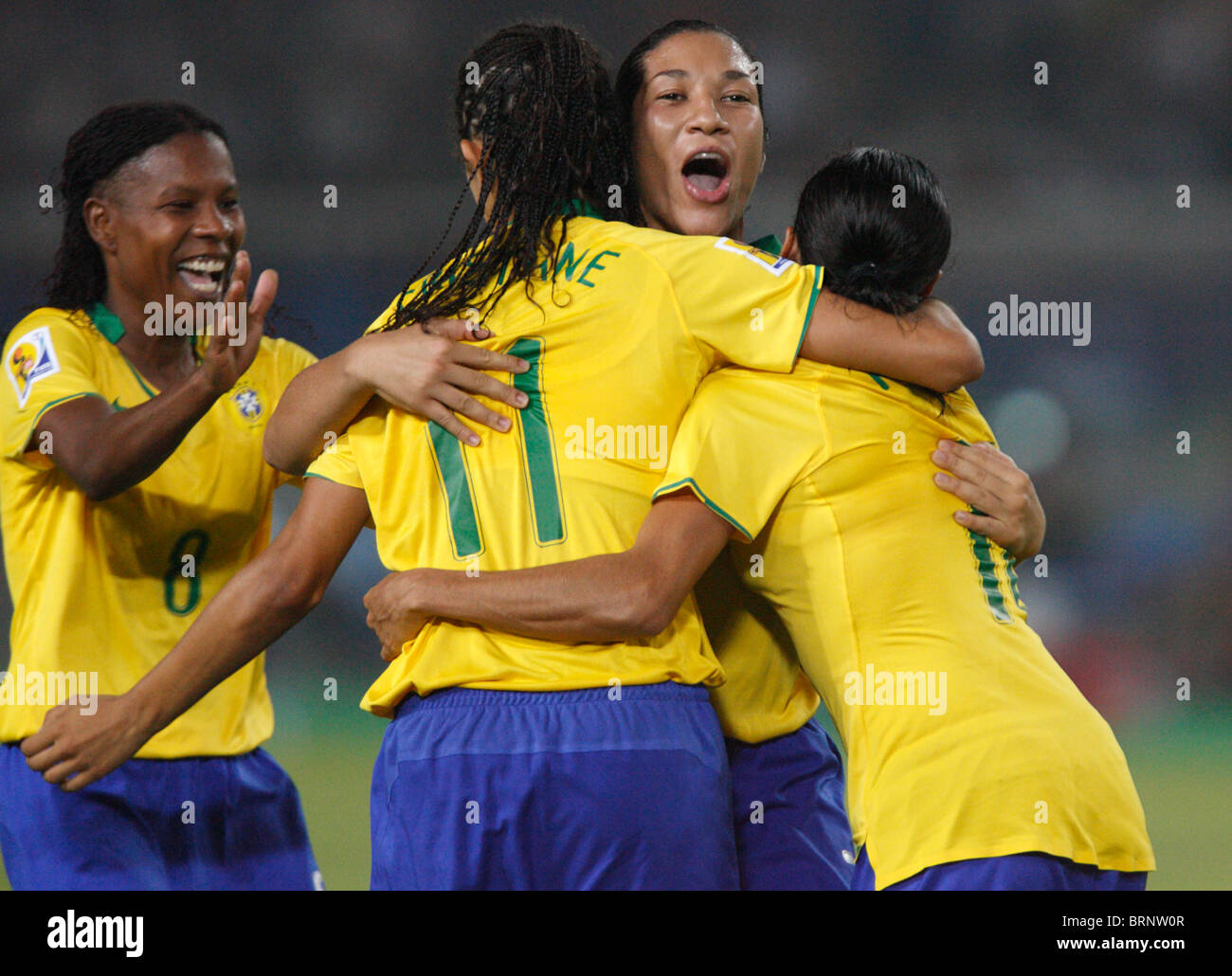 Formiga, Cristiane, Daniela and Marta (l-r) of Brazil celebrate after a goal against China during a 2007 Women's World Cup match Stock Photo