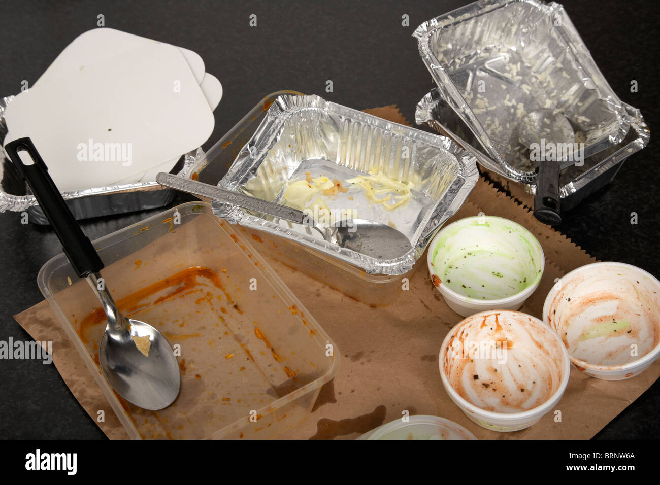 empty fast food cartons from an indian home takeaway Stock Photo