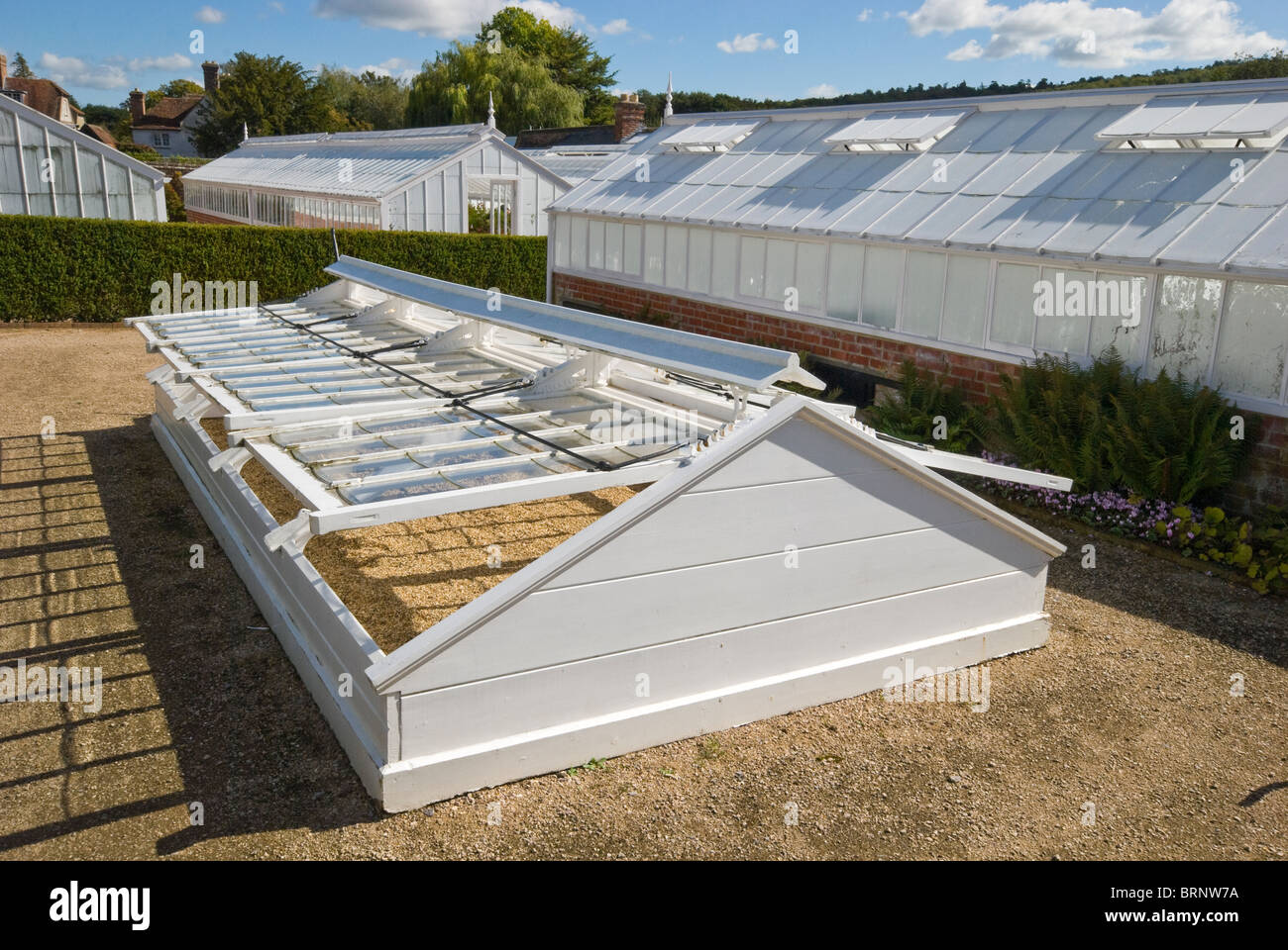 cold frames and greenhouses at west dean gardens Stock Photo Alamy