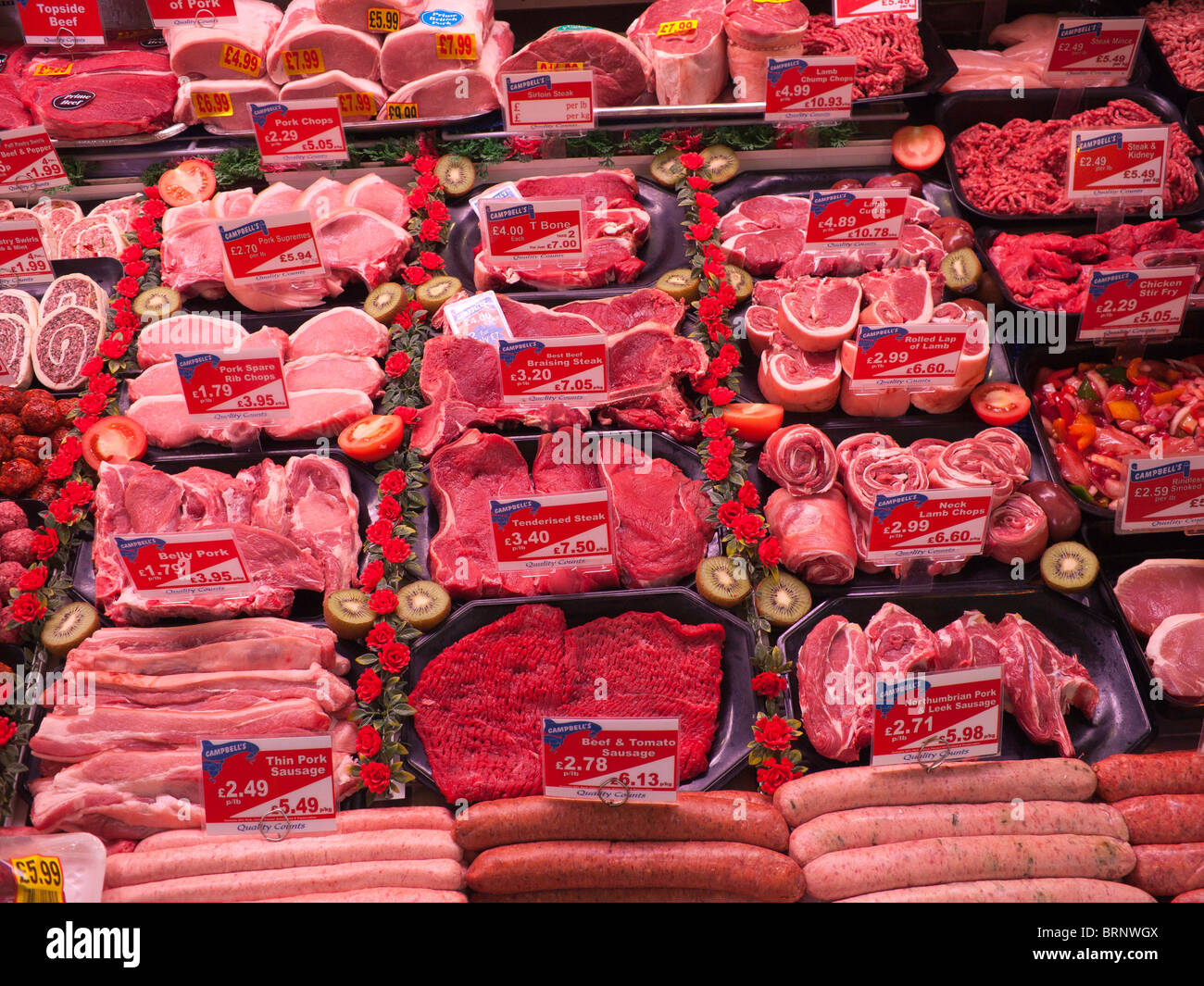 Display of beautifully prepared meat at a Butchers in Grainger Market Newcastle upon Tyne Stock Photo