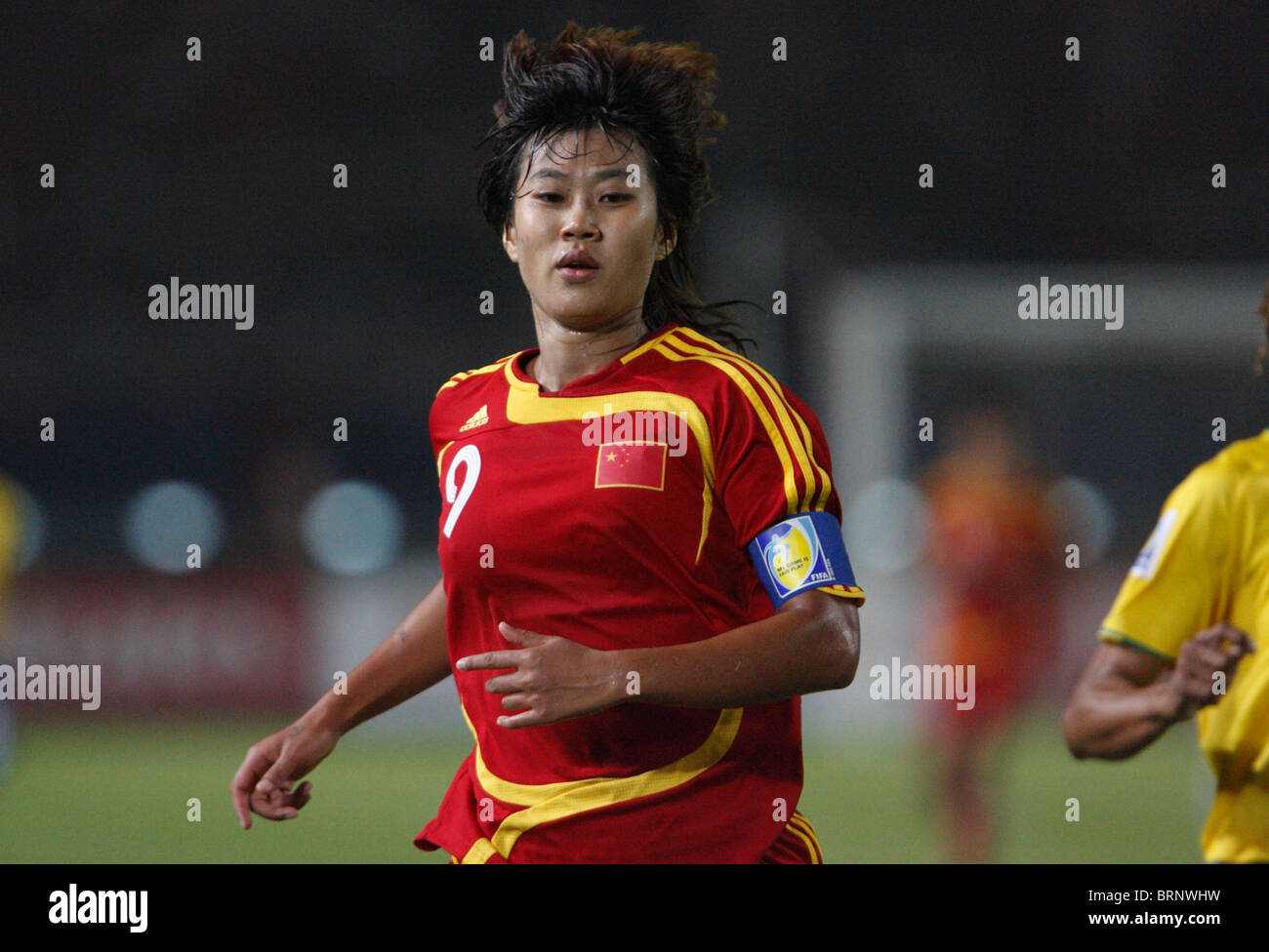 China team captain Han Duan in action during a 2007 Women's World Cup soccer match against Brazil. Stock Photo