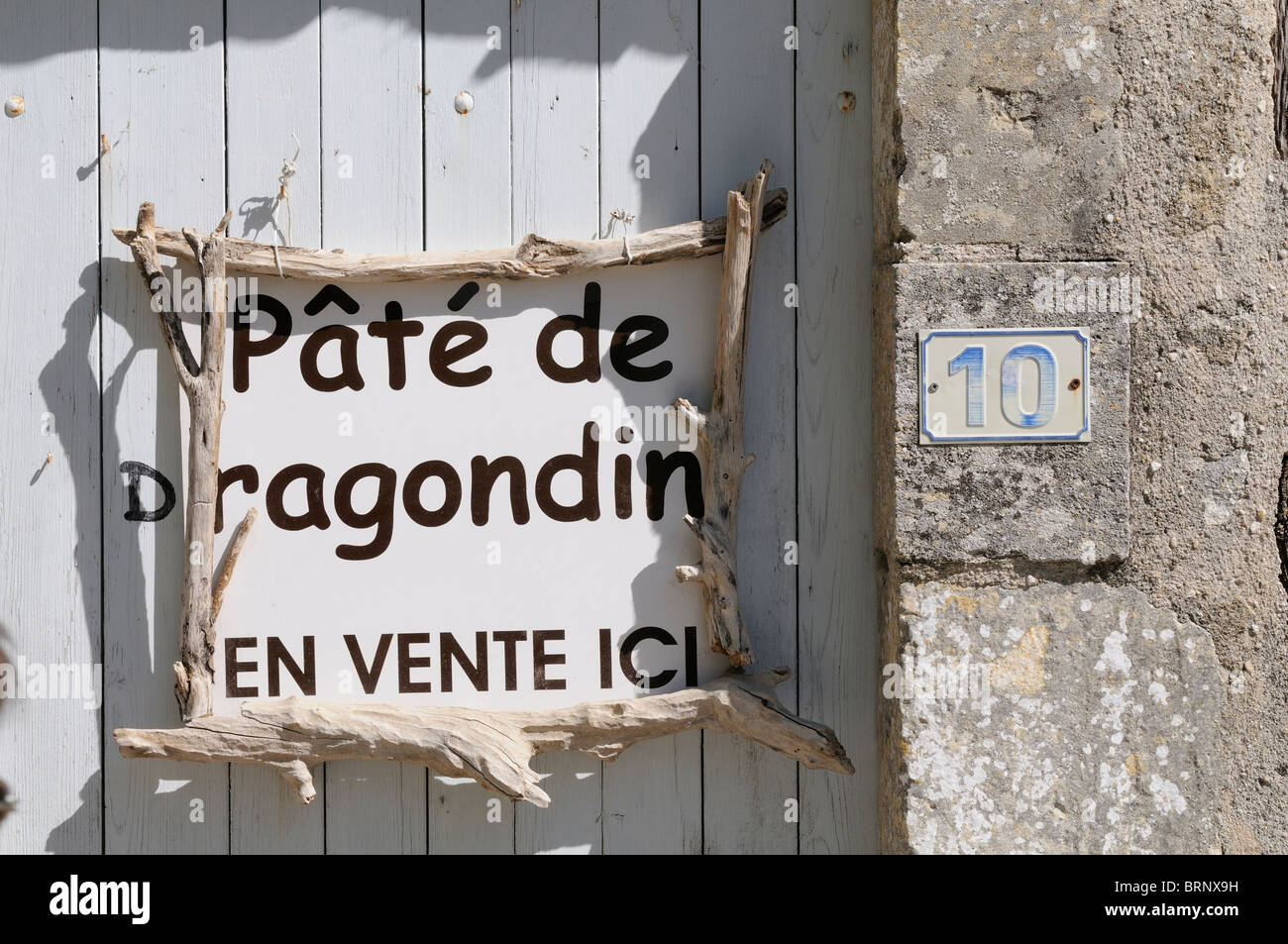 Stock photo of a sign selling pate de Ragondin. Stock Photo