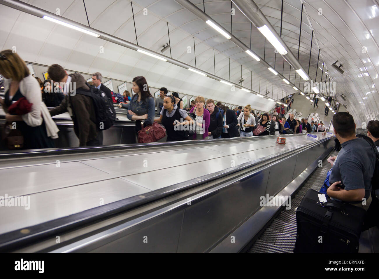 crowded escalators, London Underground, London, England Stock Photo