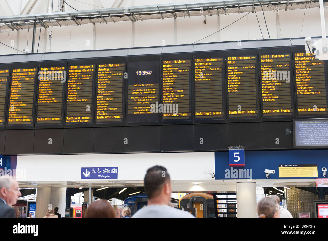 Arrivals and Departures information board at Waterloo station, London. Stock Photo