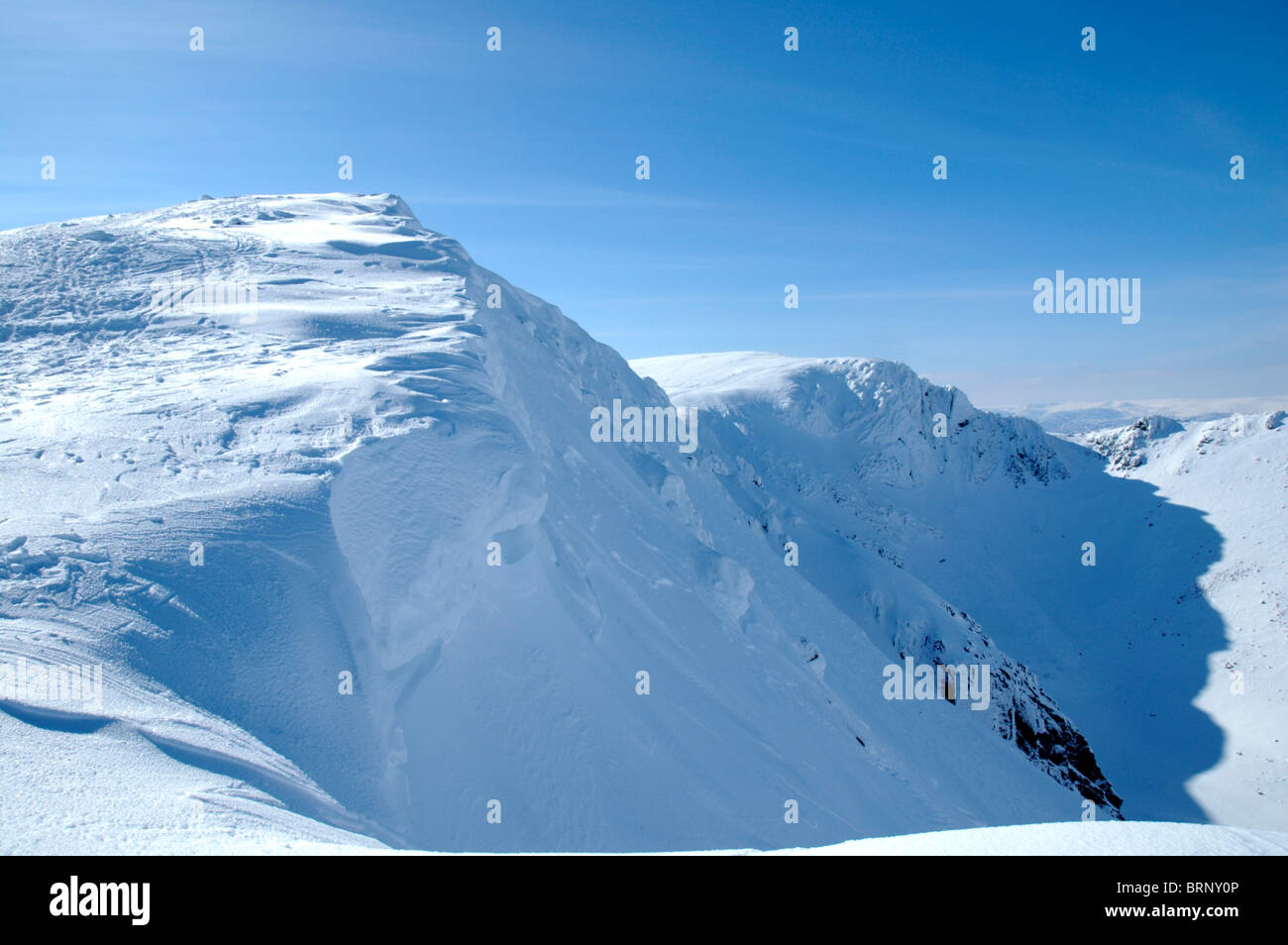 A cornice forming over the Northern Corries in the Cairngorms, Scotland. Stock Photo