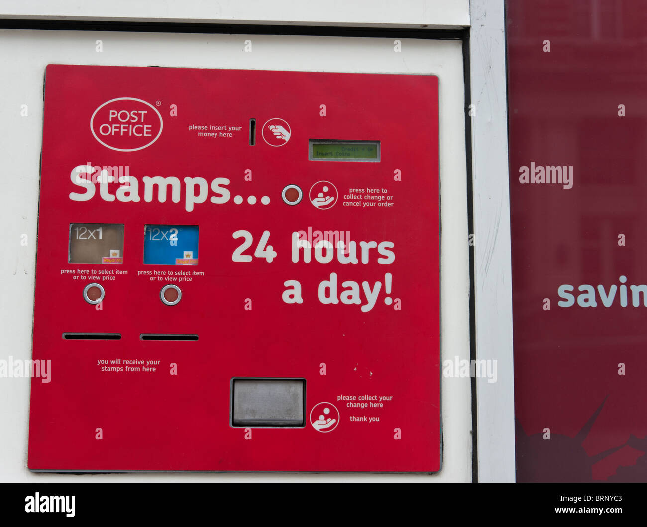 UK stamp machine, outside a London post office, selling 1st and 2nd class stamps Stock Photo Alamy