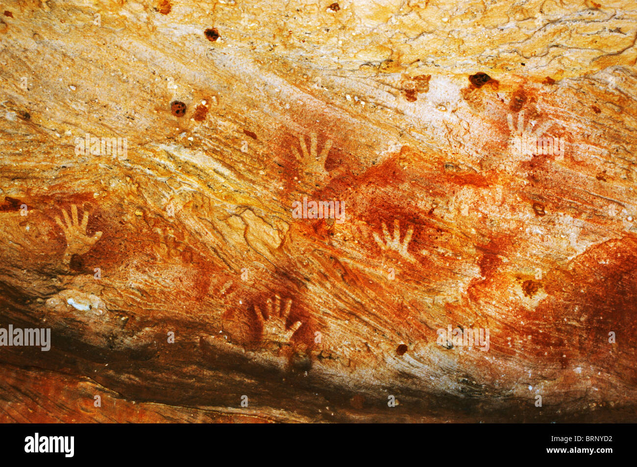 Aboriginal hand stencil art in a cave overhang, Mutawintji (formerly