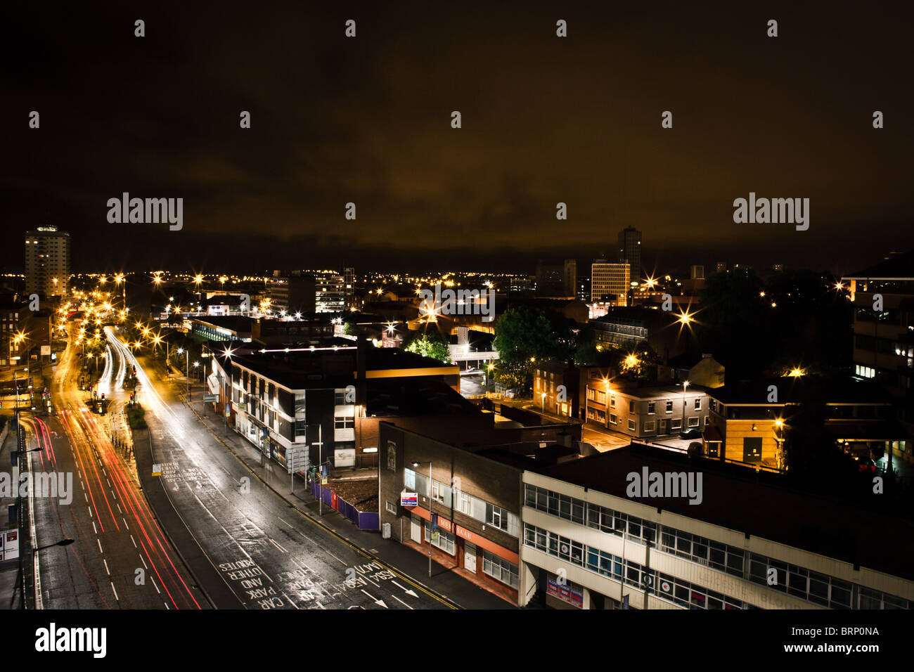 Night time high view point of a busy thoroughfare for traffic in Leicester City centre Stock Photo