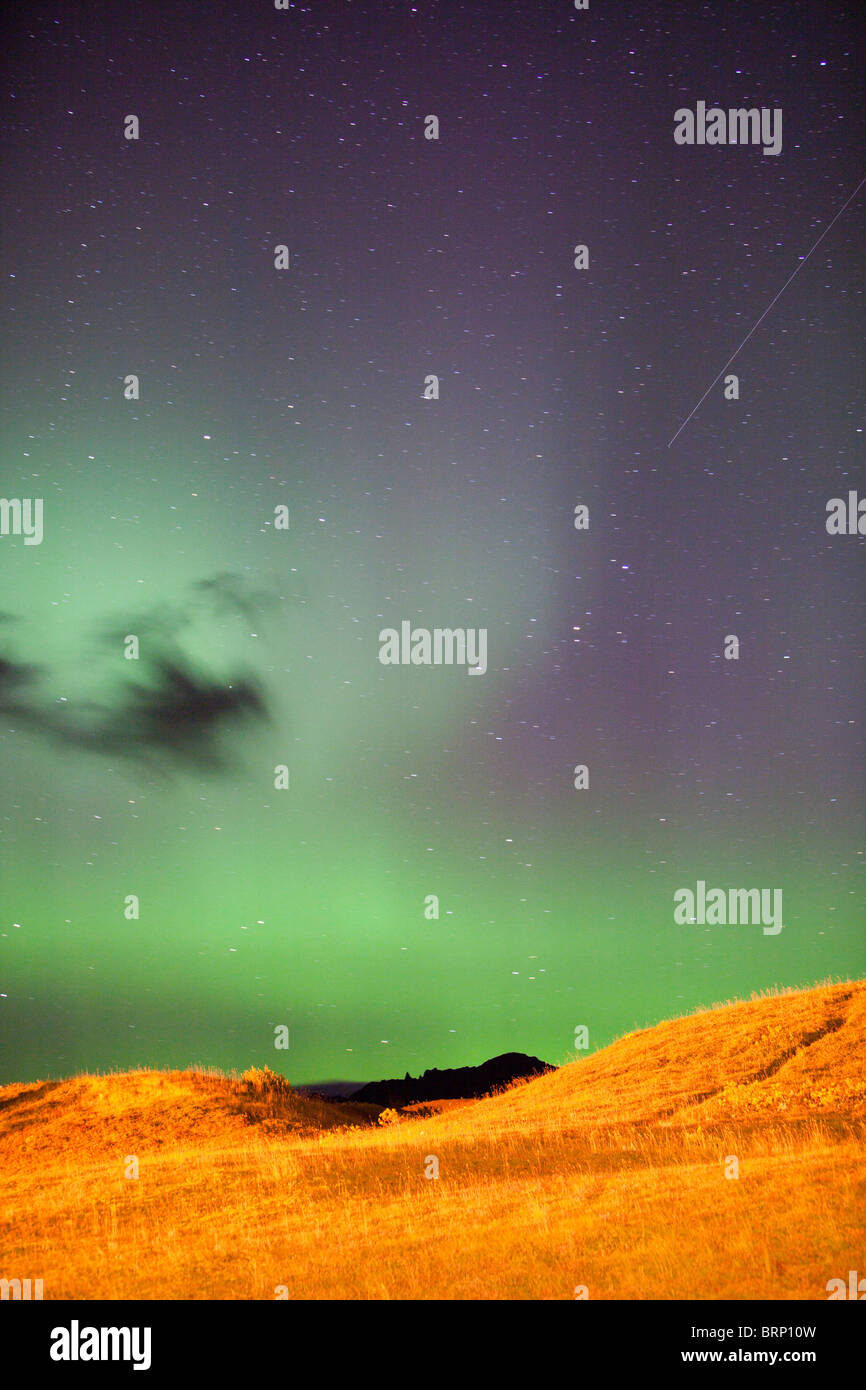 The Northern Lights or Aurora Borealis over Iceland's south Coast, at ...
