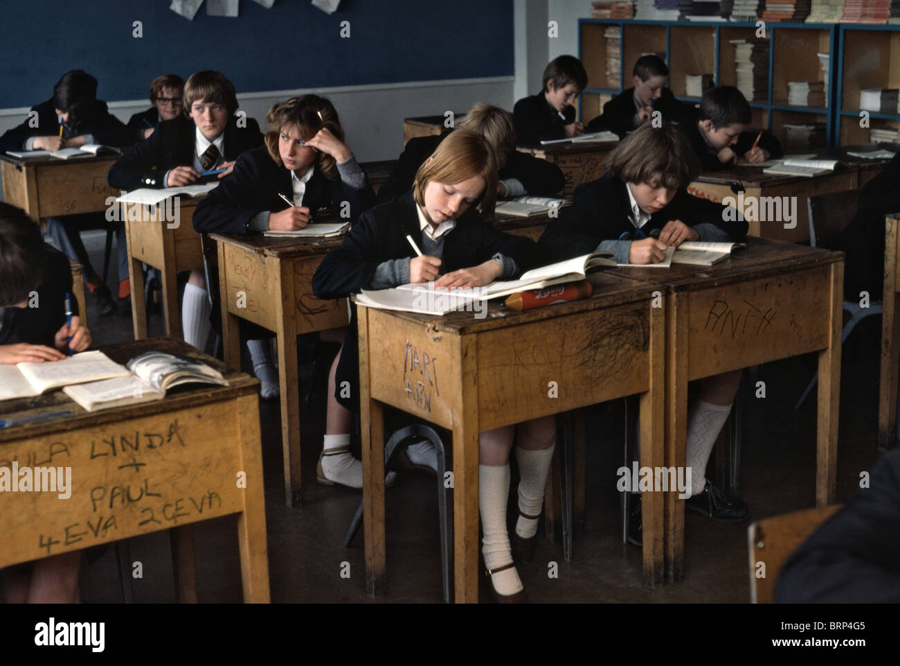 Historical Image Of Primary Classroom With Rows Of Wooden Desks