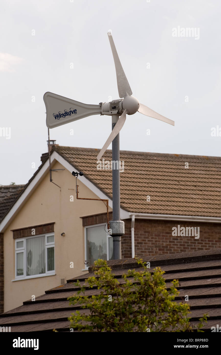 Small domestic wind turbine on a house in England. Stock Photo