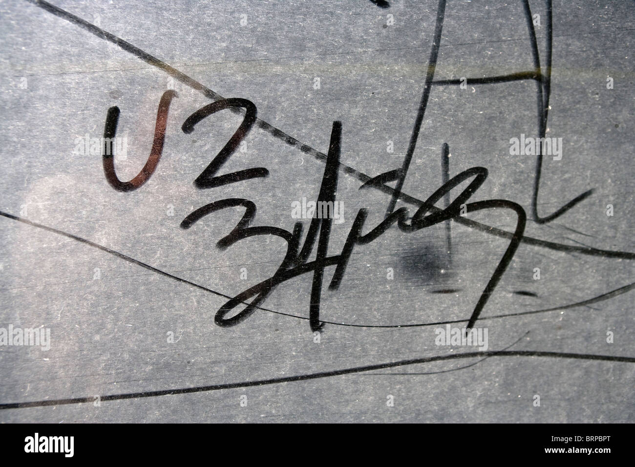 U2 live 360 tour, fan message written in dust on a truck stage transporter. Stock Photo