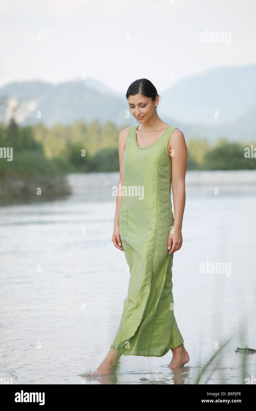 Woman in dress wading in water hi-res stock photography and images - Alamy