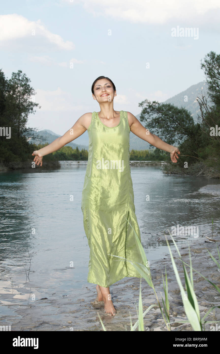 Woman In Dress Wading In Water High Resolution Stock Photography And
