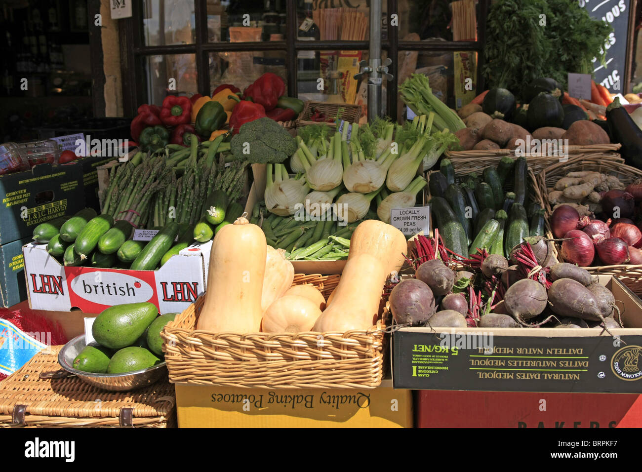 Fresh vegetables on display outside a greengrocers in Broadway England ...