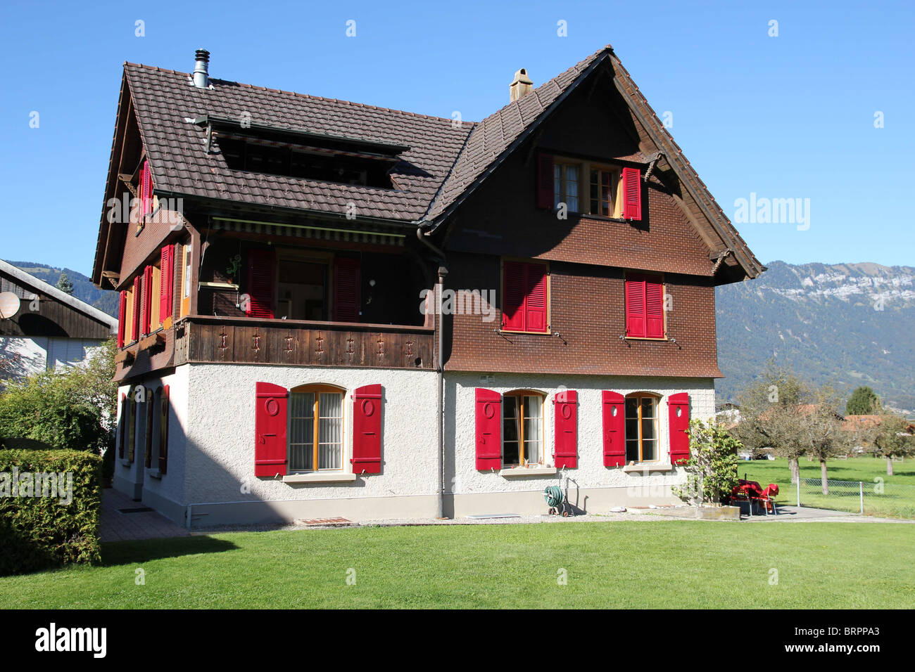 Swiss chalet in bernese Oberland - switzerland chalets swiss house  wilderswil Stock Photo - Alamy