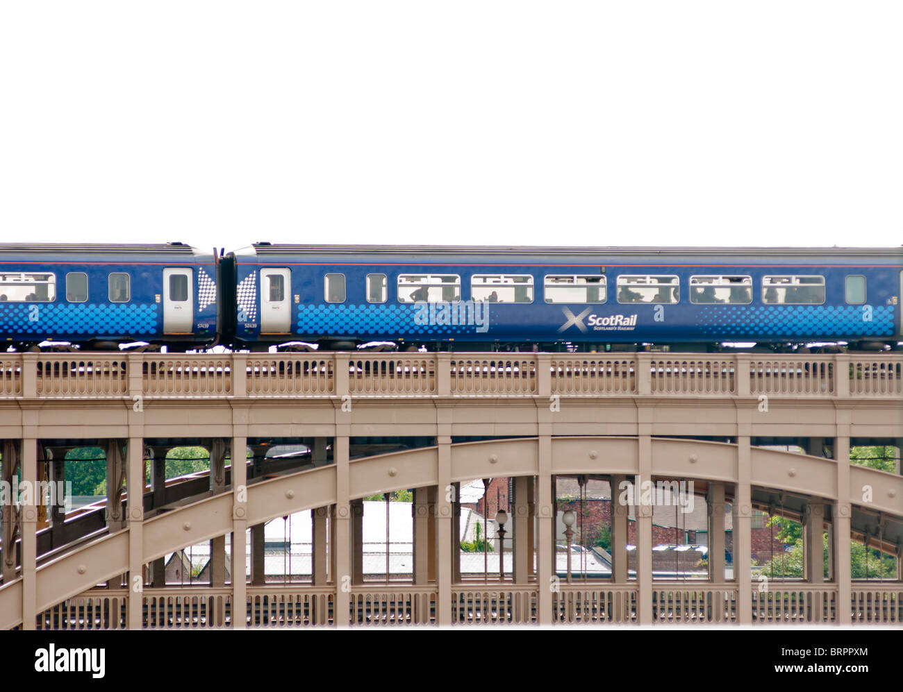 Scotrail train crossing the railway bridge on the Tyne river, Newcastle, UK Stock Photo