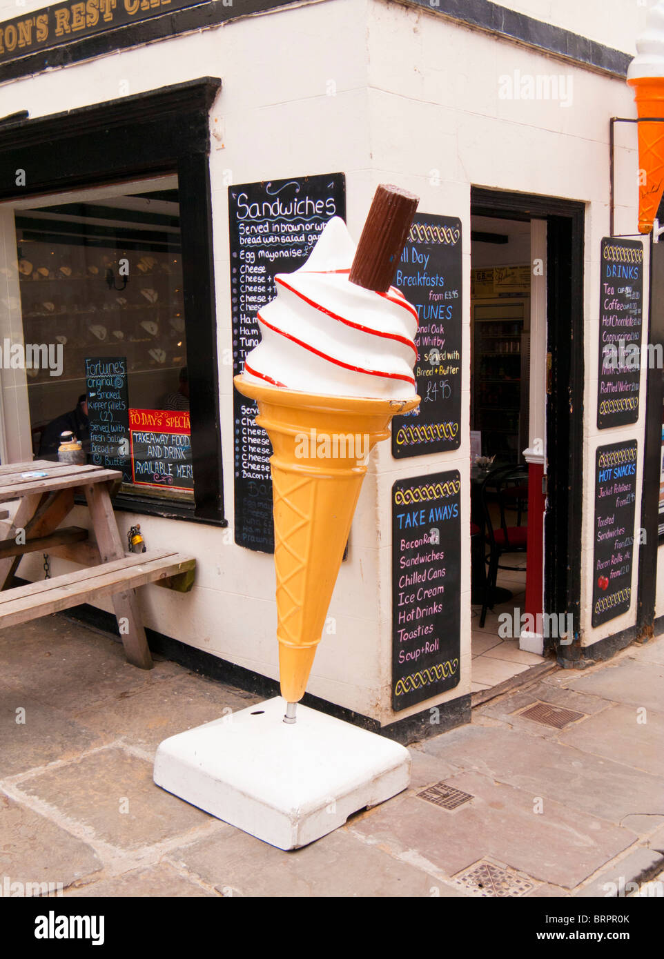Giant ice cream cone model outside a shop England UK Stock Photo