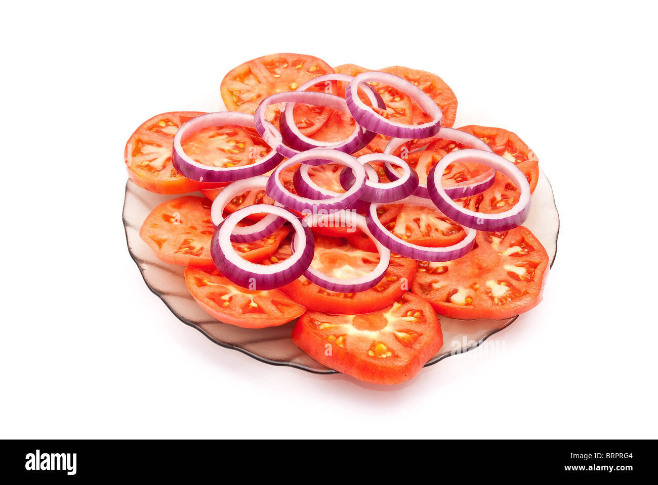 Sliced tomatoes and red onion Stock Photo Alamy
