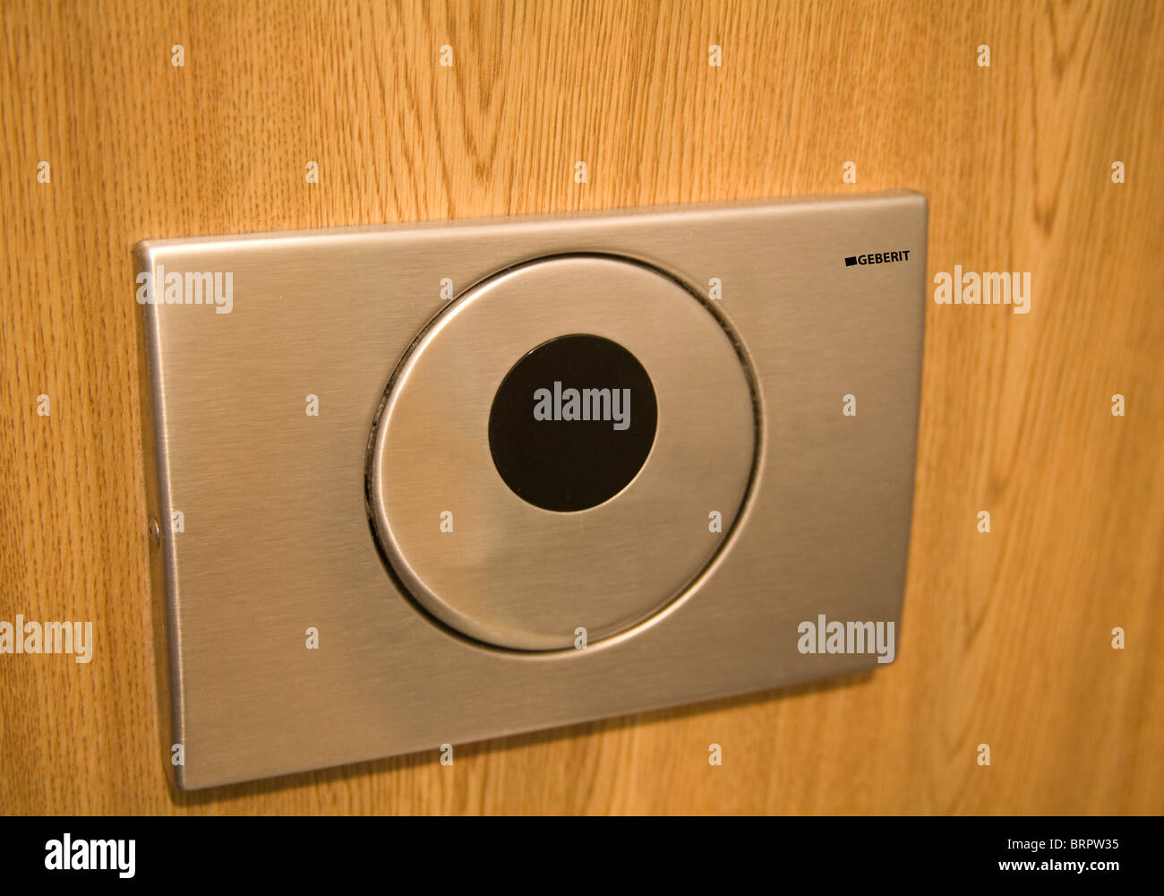 Close up of an automatic flush of a public toilet Stock Photo Alamy