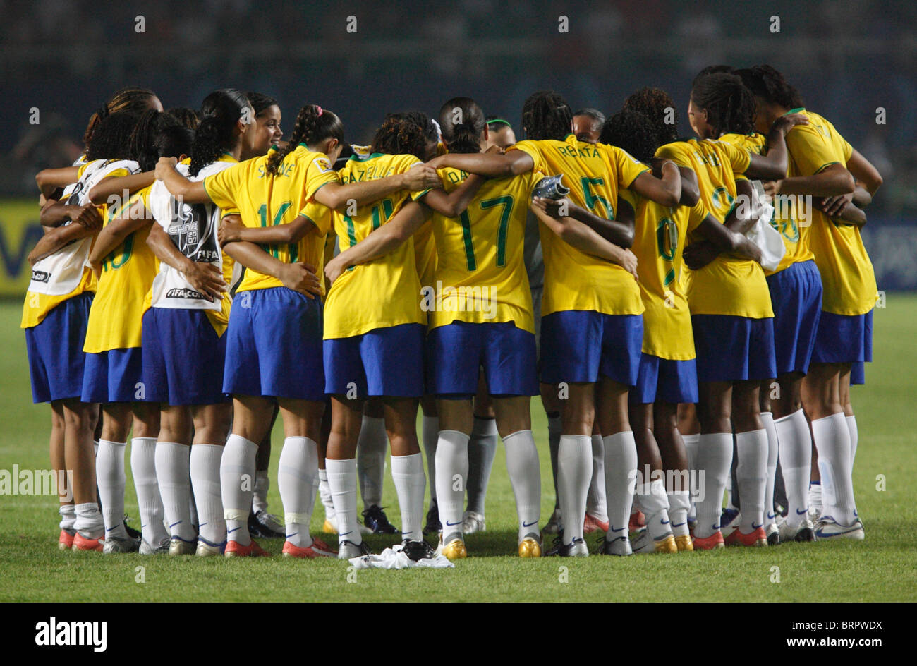The Brazilian National Team gathers together after defeating China in a 2007 Women's World Cup soccer match. Stock Photo