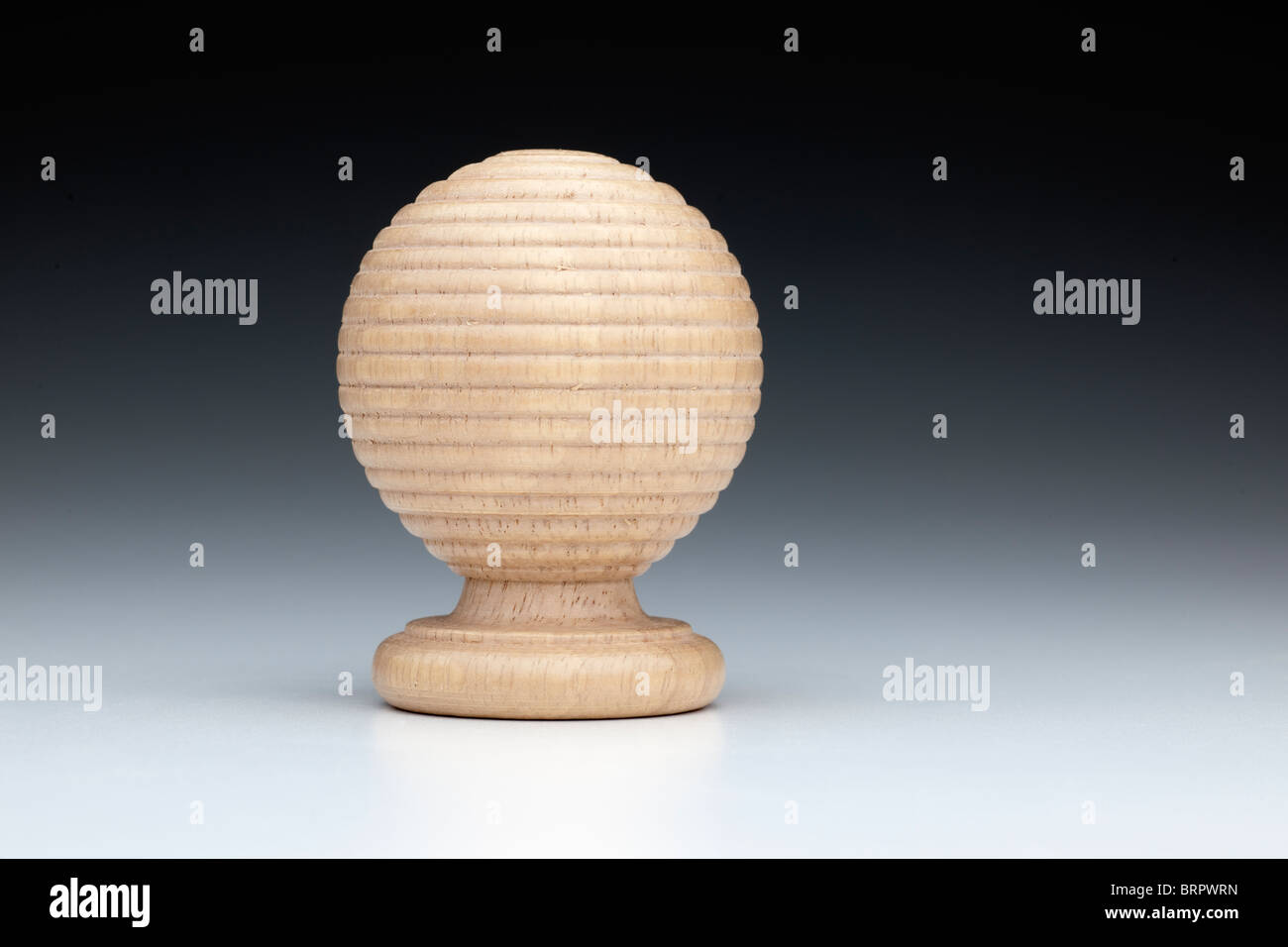 natural wooden curtain pole finial 'turned' Stock Photo