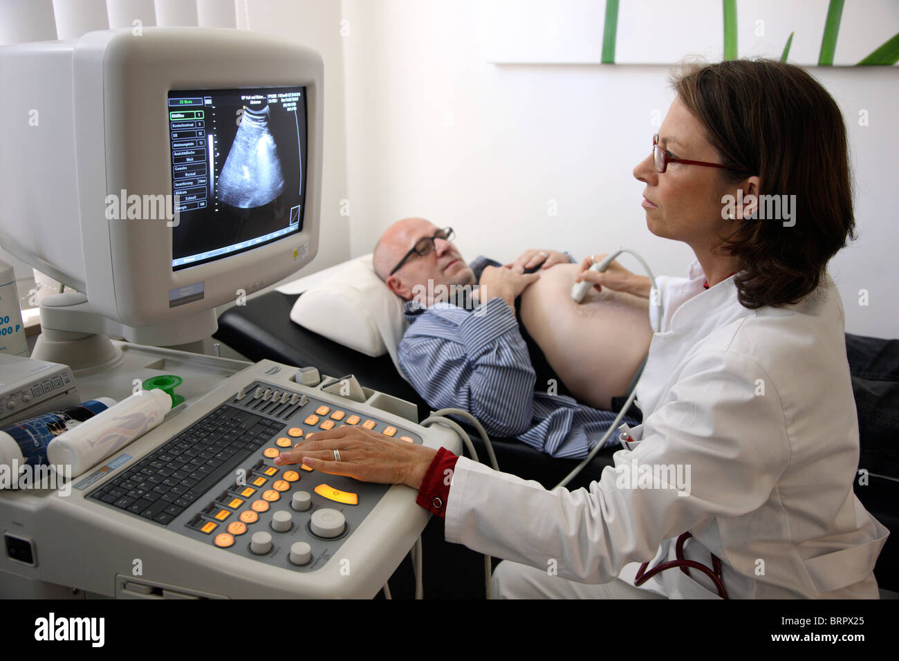 Ultrasound scanning of a male patient, medical practice in a doctors