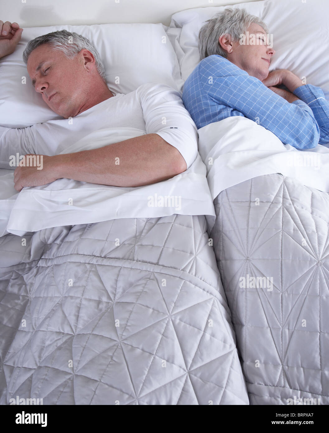 Mature woman sleeping bed vertical hi-res stock photography and images ...