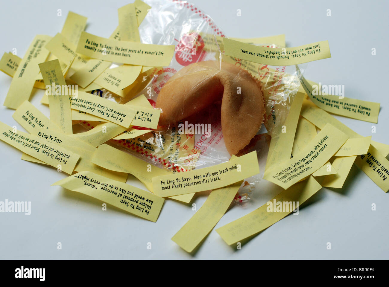 Fortune cookie surrounding by sayings Stock Photo
